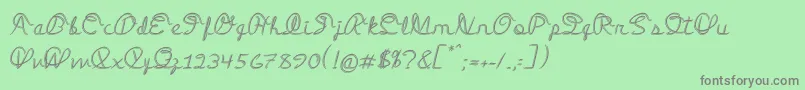 フォントMedleyScript – 緑の背景に灰色の文字