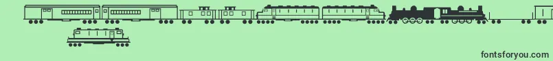 Fonte TrainsRegular – fontes pretas em um fundo verde