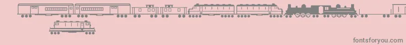 fuente TrainsRegular – Fuentes Grises Sobre Fondo Rosa