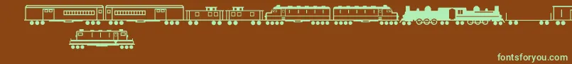 TrainsRegular Font – Green Fonts on Brown Background