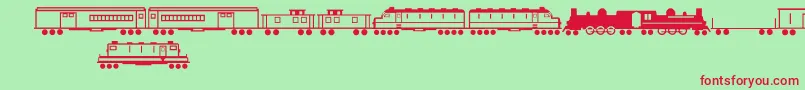 フォントTrainsRegular – 赤い文字の緑の背景