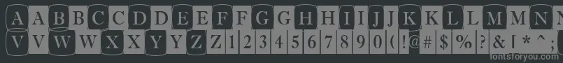 フォントAAntiquetrdcmdc1cb – 黒い背景に灰色の文字