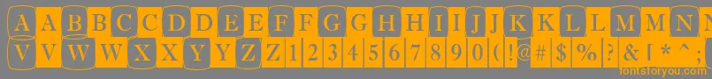 AAntiquetrdcmdc1cb-Schriftart – Orangefarbene Schriften auf grauem Hintergrund