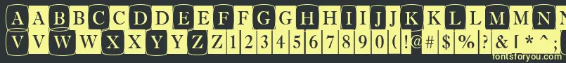 AAntiquetrdcmdc1cb Font – Yellow Fonts on Black Background