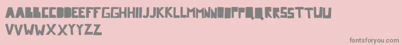 Comicdandy-Schriftart – Graue Schriften auf rosa Hintergrund