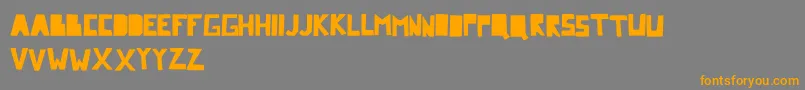 Comicdandy Font – Orange Fonts on Gray Background