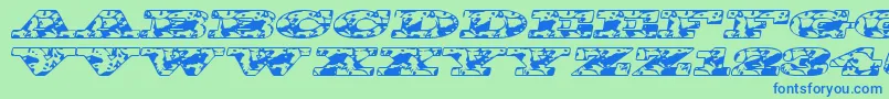 Bigspit Font – Blue Fonts on Green Background