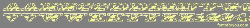 Bigspit Font – Yellow Fonts on Gray Background