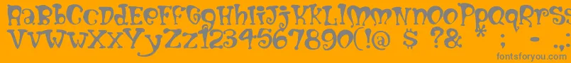 Mumblypegs-Schriftart – Graue Schriften auf orangefarbenem Hintergrund