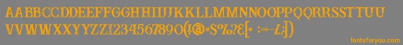 フォントBuffaloinline2grunge – オレンジの文字は灰色の背景にあります。