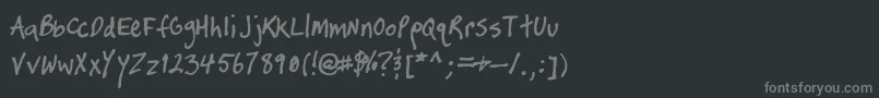 フォントTimtastic – 黒い背景に灰色の文字