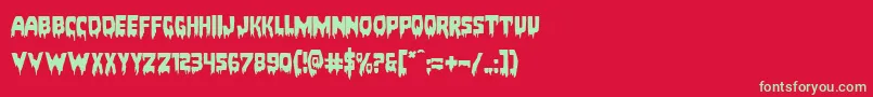 Fonte Bloodlustexpand – fontes verdes em um fundo vermelho