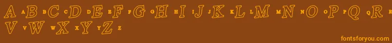 Więcej informacji o czcionce RetroSupermarket Czcionka RetroSupermarket – pomarańczowe czcionki na brązowym tle