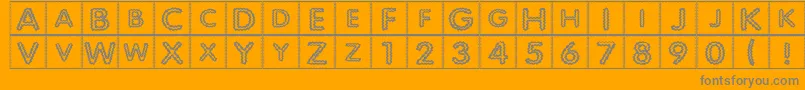 Quiltind-Schriftart – Graue Schriften auf orangefarbenem Hintergrund