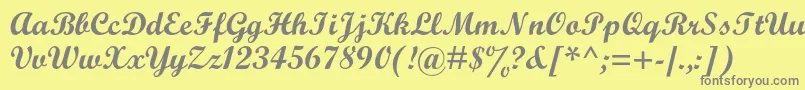 フォントScriptmtstdBold – 黄色の背景に灰色の文字