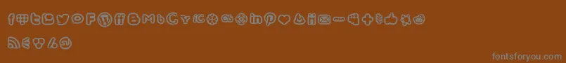 Czcionka SocialMediaIconsBold – szare czcionki na brązowym tle
