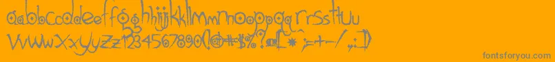 Gothichijinxrough-fontti – harmaat kirjasimet oranssilla taustalla