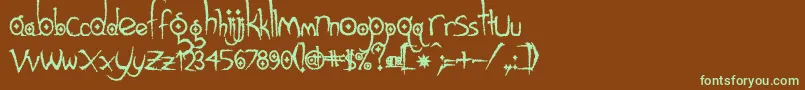 Шрифт Gothichijinxrough – зелёные шрифты на коричневом фоне