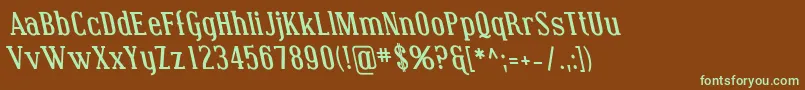 フォントCoving16 – 緑色の文字が茶色の背景にあります。