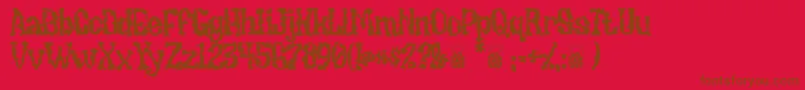 Undiecrust-Schriftart – Braune Schriften auf rotem Hintergrund