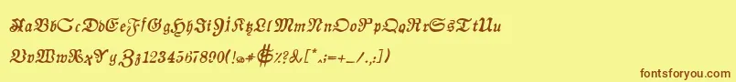 フォントAuldmagickBoldItalic – 茶色の文字が黄色の背景にあります。