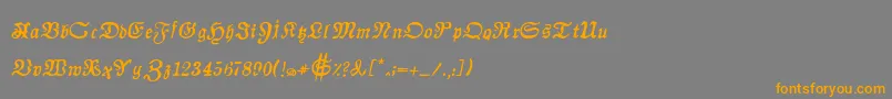 フォントAuldmagickBoldItalic – オレンジの文字は灰色の背景にあります。