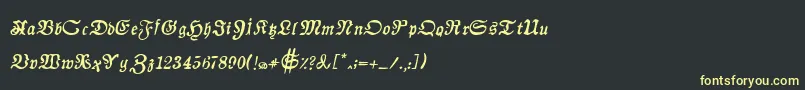 フォントAuldmagickBoldItalic – 黒い背景に黄色の文字