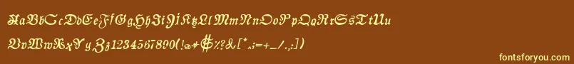 AuldmagickBoldItalic-fontti – keltaiset fontit ruskealla taustalla