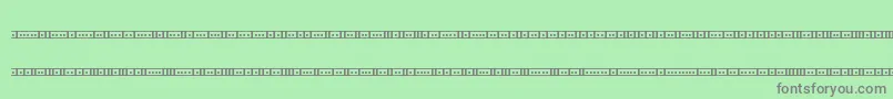 BinaryX01sBrk-Schriftart – Graue Schriften auf grünem Hintergrund