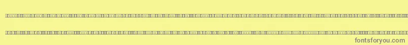 BinaryX01sBrk Font – Gray Fonts on Yellow Background