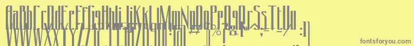 Conydecor-fontti – harmaat kirjasimet keltaisella taustalla