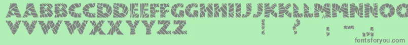 JmhMummyFill-fontti – harmaat kirjasimet vihreällä taustalla