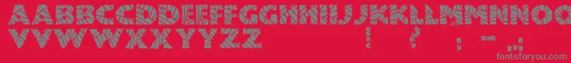 JmhMummyFill-fontti – harmaat kirjasimet punaisella taustalla