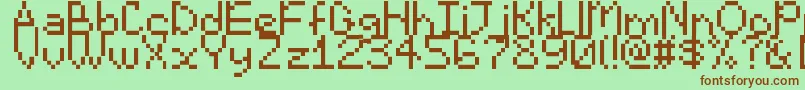 Emoticomic-fontti – ruskeat fontit vihreällä taustalla