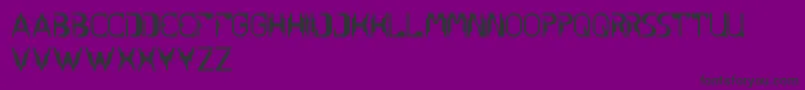Czcionka UnderStand – czarne czcionki na fioletowym tle