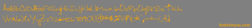 フォントWhiteyford – オレンジの文字は灰色の背景にあります。