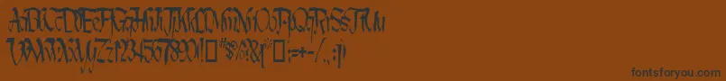 Czcionka LotharusWideTop – czarne czcionki na brązowym tle