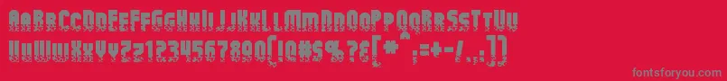 Czcionka AlphaMutation – szare czcionki na czerwonym tle