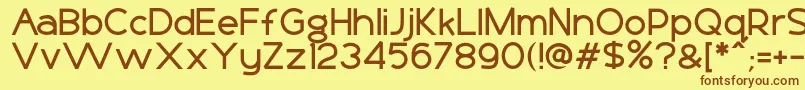 Basico1-Schriftart – Braune Schriften auf gelbem Hintergrund