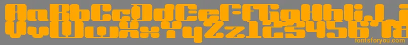 フォントDrvinyl – オレンジの文字は灰色の背景にあります。