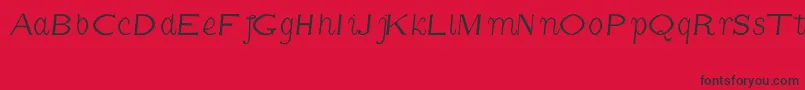 CmFunnyItalic-Schriftart – Schwarze Schriften auf rotem Hintergrund