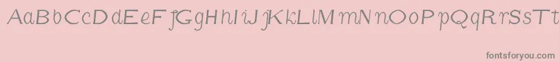 CmFunnyItalic-fontti – harmaat kirjasimet vaaleanpunaisella taustalla