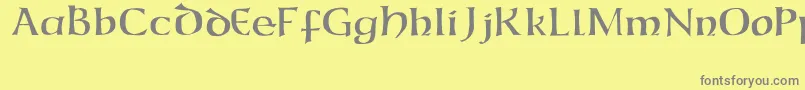 フォントCaliforniaUncial – 黄色の背景に灰色の文字