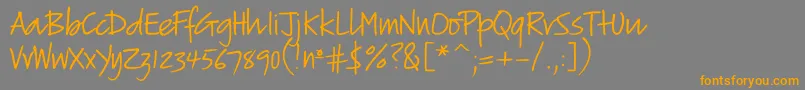 フォントVerticalscript – オレンジの文字は灰色の背景にあります。