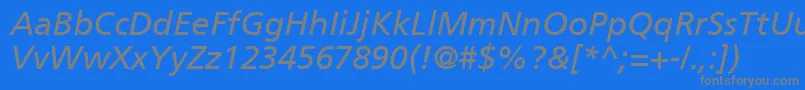 PalmaSsiItalic-fontti – harmaat kirjasimet sinisellä taustalla