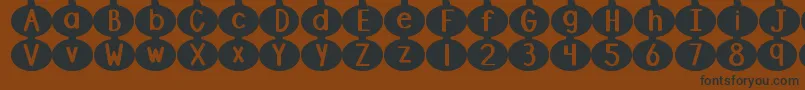 DjbLinusPumpkin2 Font – Black Fonts on Brown Background