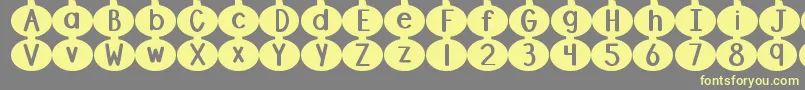 DjbLinusPumpkin2 Font – Yellow Fonts on Gray Background