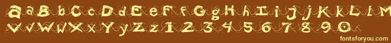 Wlentanglemental-fontti – keltaiset fontit ruskealla taustalla