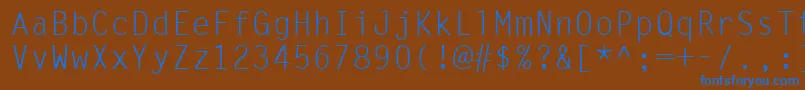 Czcionka Ukrmonospaced – niebieskie czcionki na brązowym tle