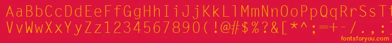 Ukrmonospaced-Schriftart – Orangefarbene Schriften auf rotem Hintergrund